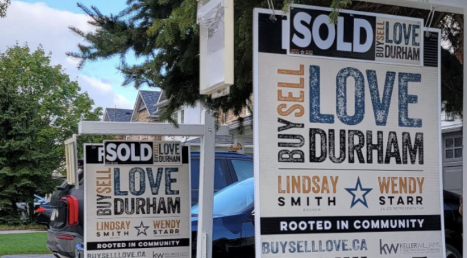 Buy Sell Love Durham featured blog image showing two side-by-side Buy Sell Love Durham Sold Signs