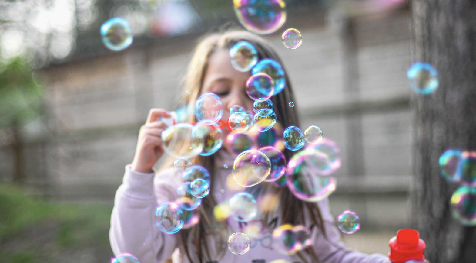 Buy Sell Love Durham featured blog image - little girl with bubbles
